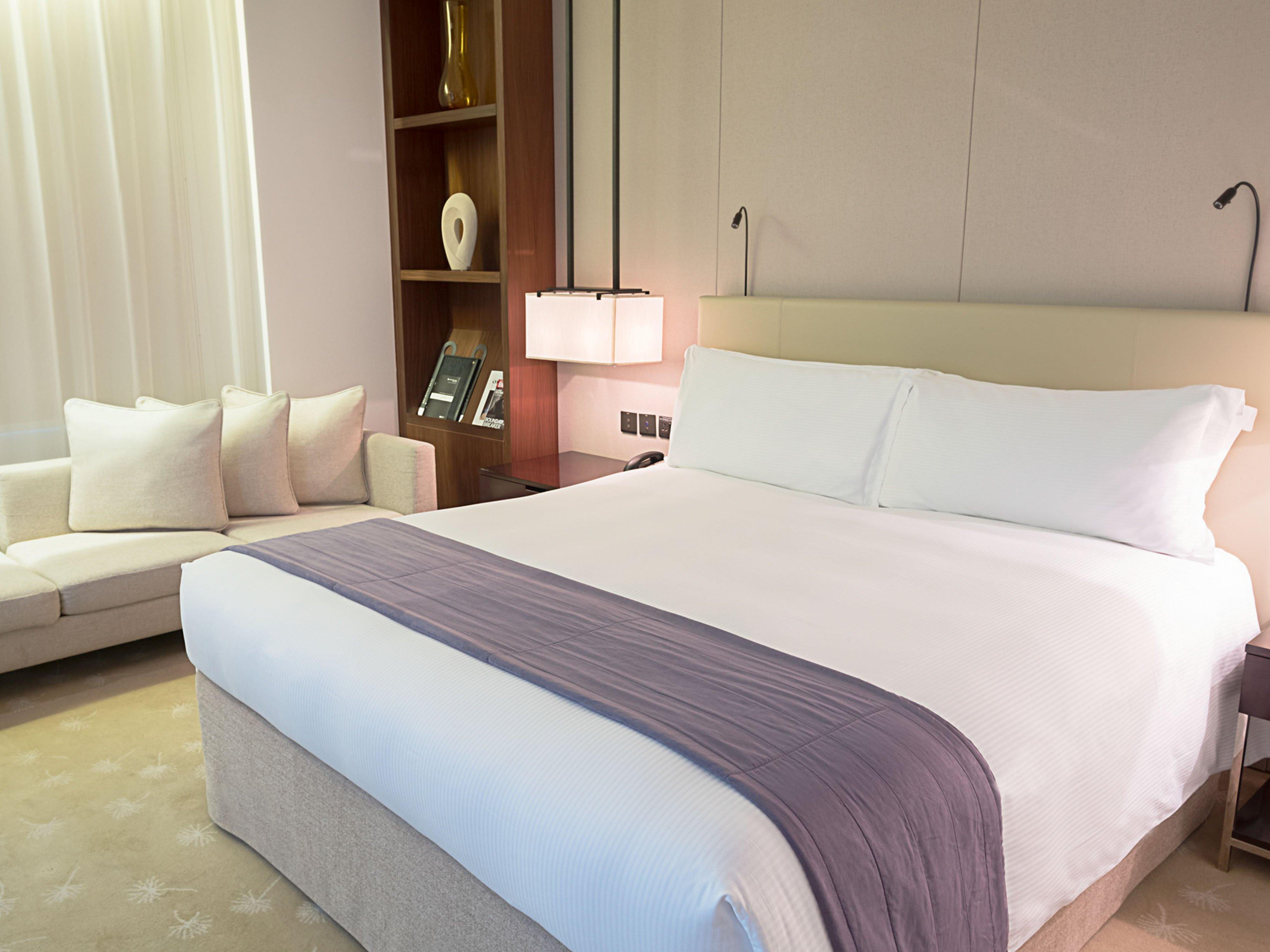 Intercontinental Dubai Festival City By Ihg Exterior photo A bed with a bed runner