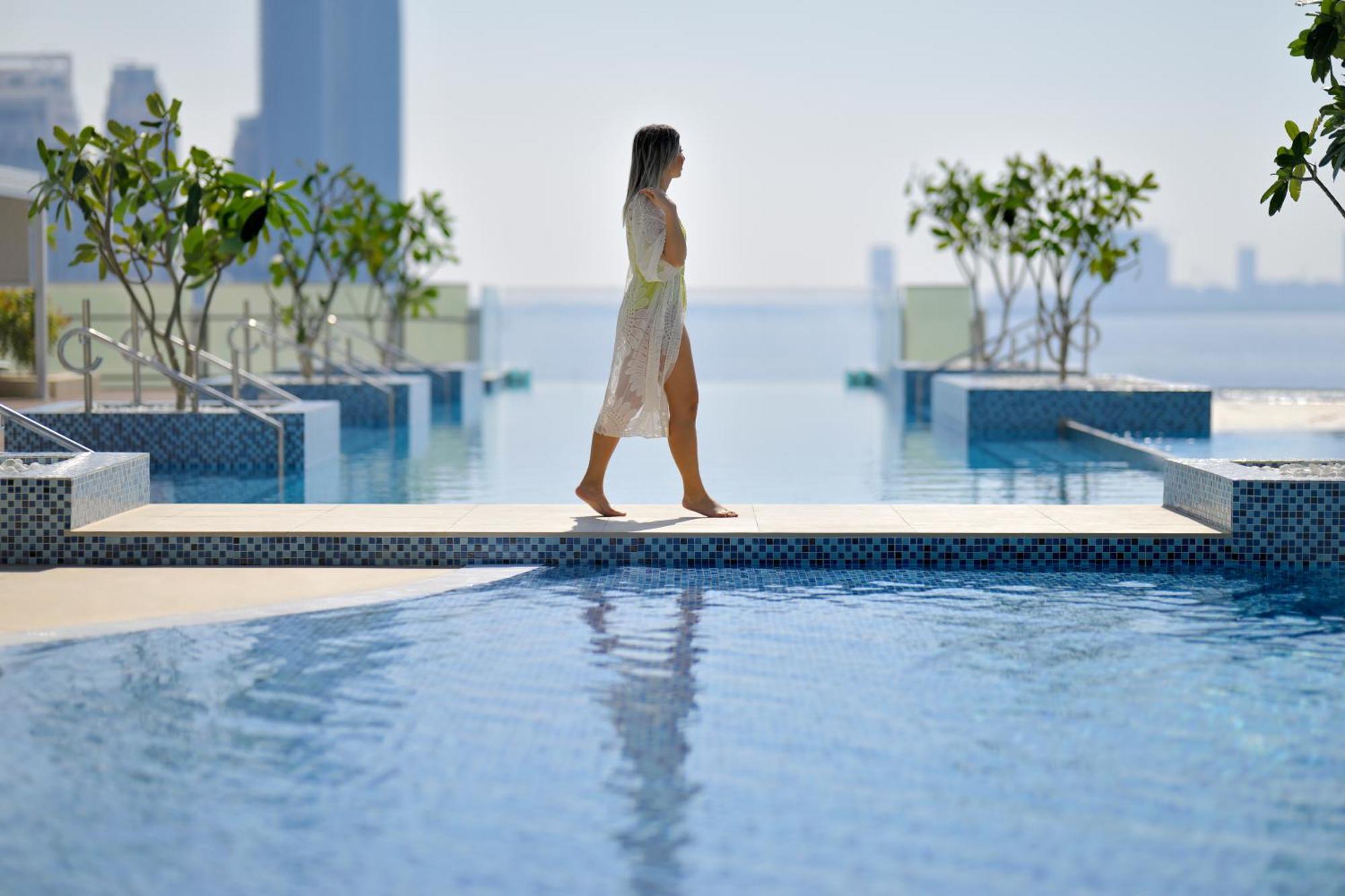 Intercontinental Dubai Festival City By Ihg Exterior photo The swimming pool at the Address Downtown